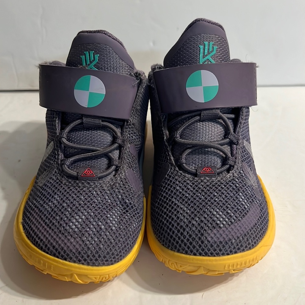 Kyrie Irving Nike  7C purple/yellow flame on Nike swoosh.  Toddler